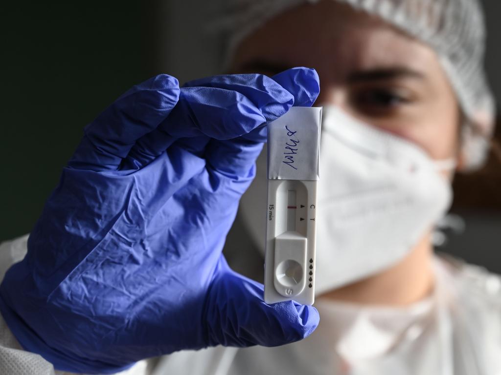 A member of the French Red Cross presents an antigen test at a mobile coronavirus screening, site on November 19, 2020, in southeastern France. Picture: AFP