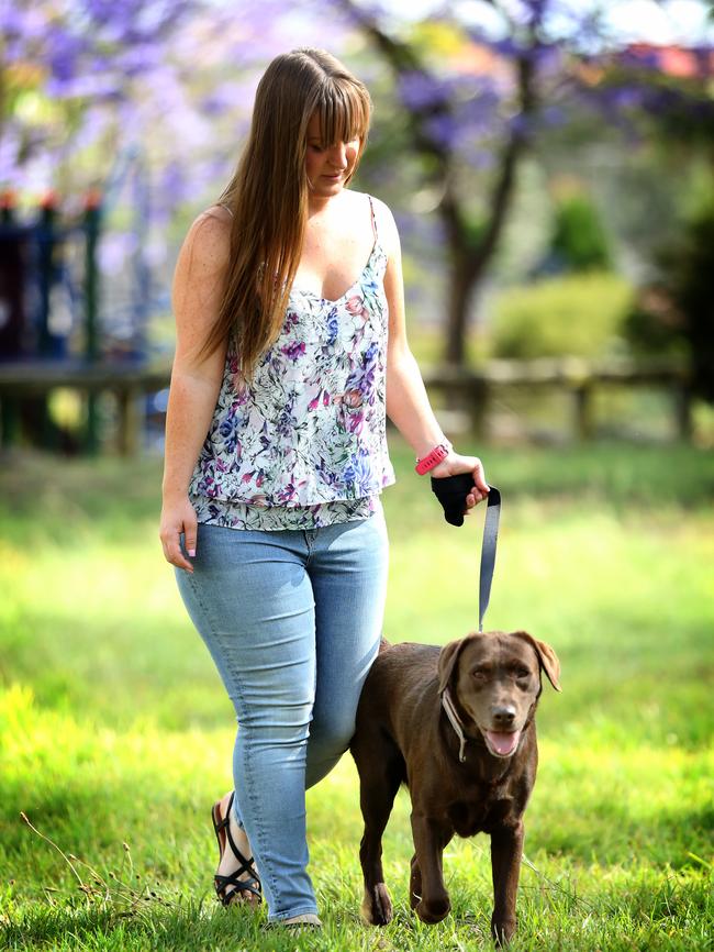 Laura Banks takes Molly for a walk. Picture: Angelo Velardo.