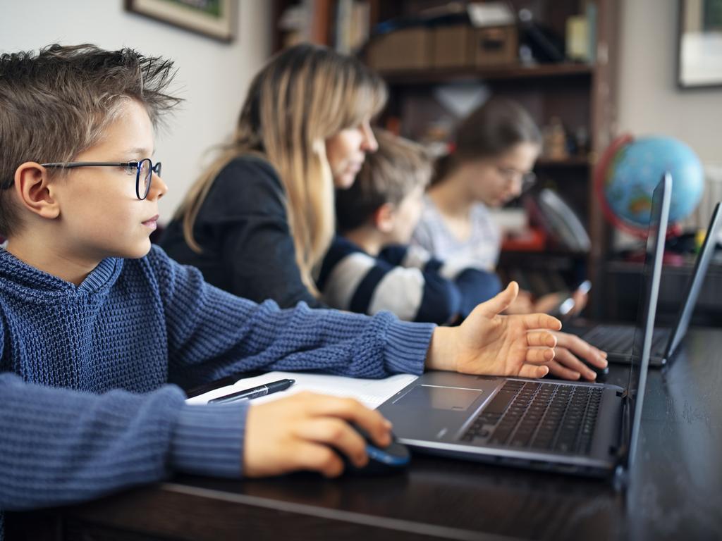 Parents and children are now sharing computers for work, school and personal use and it can be a dangerous mix. Picture: iStock