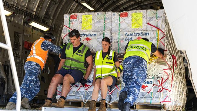 Relief goods being loaded onto a Royal Australian Air Force C-17A Globemaster III bound for Vanuatu from RAAF Base Amberley in Queensland. Picture: DFAT/Dept of Defence