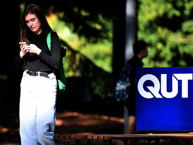 BRISBANE, AUSTRALIA - NCA NewsWire Photos AUGUST, 05, 2020.A QUT university student is seen on campus in Brisbane. Students face losing their concession fares because Translink loophole doesn't grant cheaper fares to external students.Picture: NCA NewsWire/Dan Peled