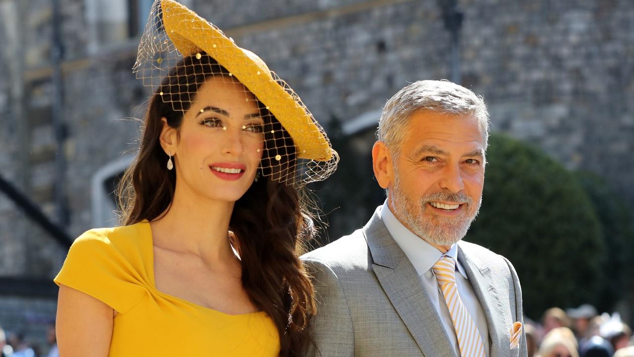 Amal and George Clooney at Harry and Meghan’s wedding. Picture: AFP Photo/Pool/Gareth Fuller