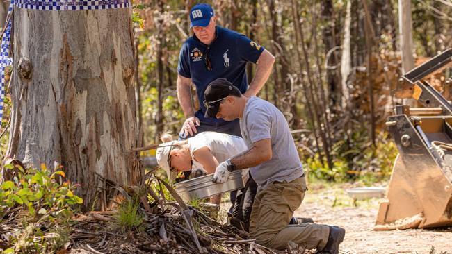 Police searching for evidence in the Dargo area as part of the missing campers murder investigation.