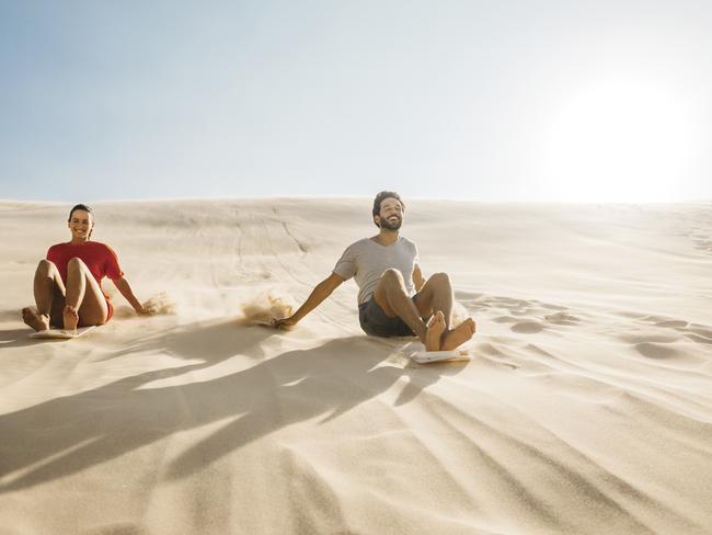 19. RIDE THE DUNES Head to Anna Bay in Port Stephens to sand board and sand surf your way down the largest sand dunes in the Southern Hemisphere.