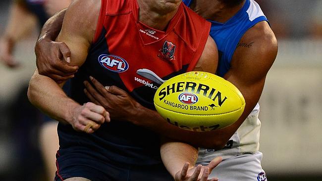  Melbourne v Gold Coast,MCG, James Strauss tackled by AAron Hall, 