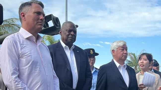 Defence Minister Richard Marles, US Defense Secretary Lloyd Austin and Japanese Defense Minister Gen Nakatani at HMAS Coonawarra.