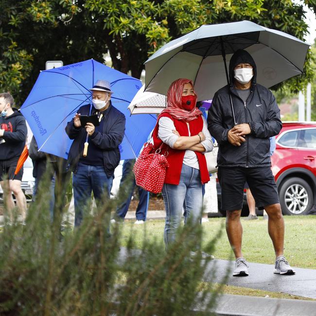 Day 2 in lockdown. Members of the public line up to get tested for Covid at the Albert Waterways Community centre. Picture: Tertius Pickard