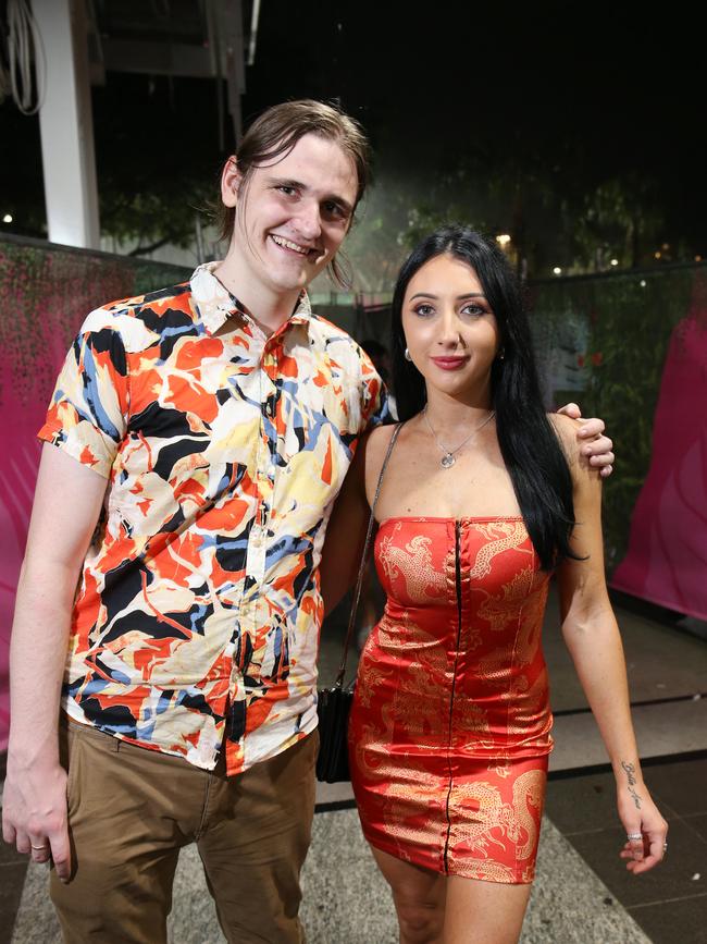 Jasper Corker and Taylah Jarrett celebrated New Year's Eve together on the Cairns Esplanade. Picture: Brendan Radke
