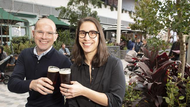 Katie Shiff and Max Putman enjoy a beer in the new outdoor dining precinct. Picture: Ellen Smith