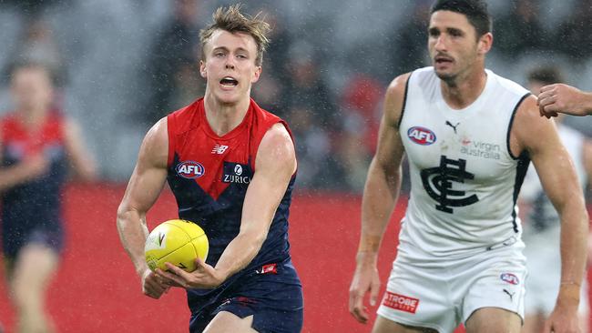 AFL Round 9. 16/05/2021 . Melbourne vs Carlton at the MCG, Melbourne. James Jordon of the Demons clears . Pic: Michael Klein