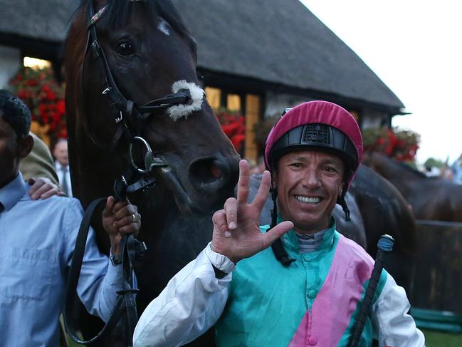 NEWMARKET, ENGLAND - AUGUST 12: Frankie Dettori celebrates riding his 3000th winner on Predilection in The James Hardie Cladding @U.Plastics Handicap Stakes at Newmarket Racecourse on August 12, 2016 in Newmarket, England. (Photo by Alan Crowhurst/Getty Images)