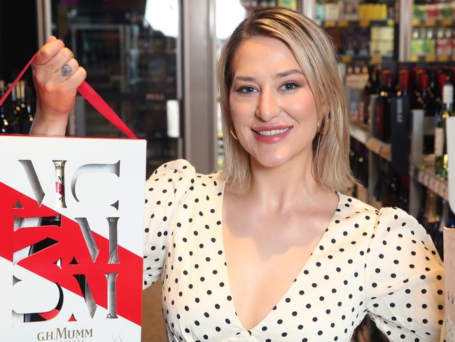 Lifestyle .Last-minute gift ideas for loved ones. photos of Hannah Chapman, 28, buying alcohol in Liquorland , Richmond. Friday, December 9, 2022. Picture: David Crosling