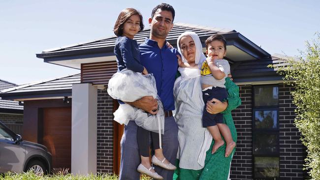 Bilal Mustafa with his wife Wajiha and kids Aaima and Awhile at their Riverstone home. Picture: Sam Ruttyn