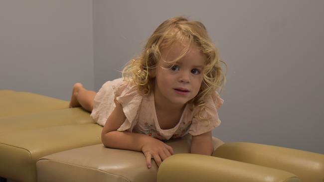 Two year old Matilda ready for an adjustment at the new Spine Care Clinic in Mackay