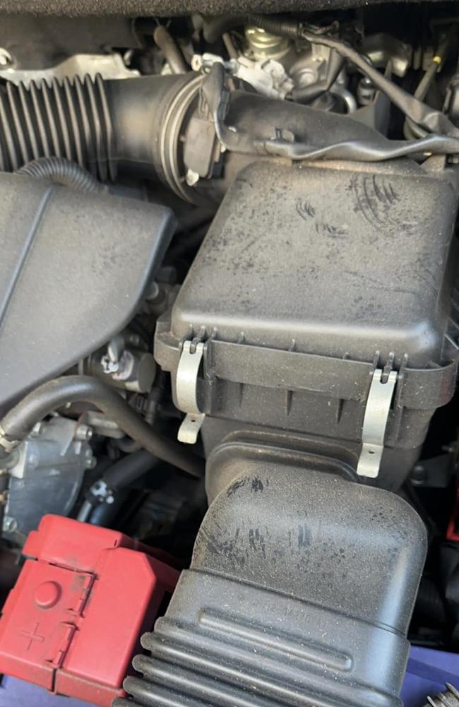 Under the bonnet of Kristie Owen’s car which shows rat footprints. Picture: Contributed