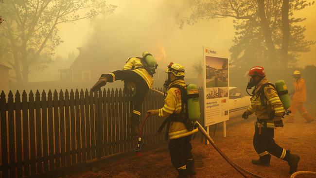 Firefighters attempt to protect the town of Balmoral. Picture: Sam Ruttyn