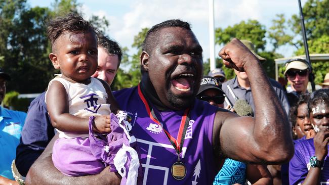 Tikilaru Dockers players celebrate their win during TIFL Grand Final Picture: Keri Megelus