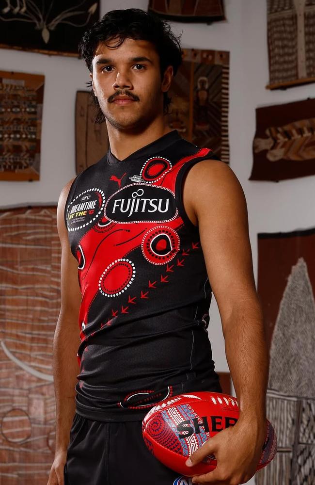 Alywn Davey Jr models Essendon's Indigenous round jumper. Picture: Essendon FC