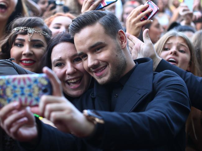 Liam Payne taking a selfie with fans at the 28th Annual ARIA Awards 2014 at the Star in Sydney. Picture: Getty Images