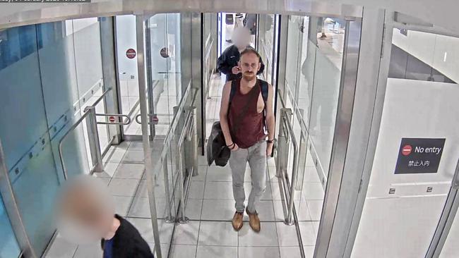 Anthony Stott arriving at the airport Picture: NSW Police