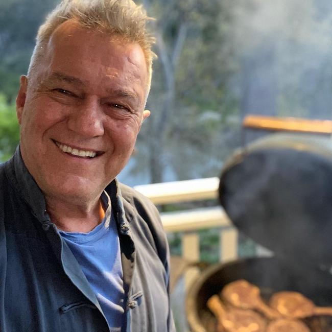 Barnes at work on one of his many grills. Picture: Instagram/Jimmy Barnes.