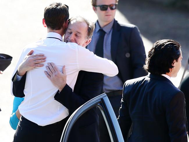 Simon Deall, 32, was comforted by family and friends at the funeral service of his beloved wife Annabelle Deall. Picture: Peter Clark