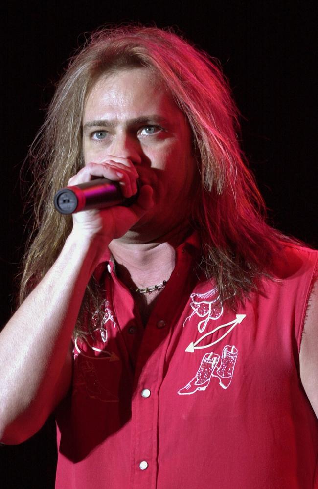 404953 12: Skid Row vocalist Johnny Solinger performs at the Music Midtown festival May 4, 2002 in Atlanta. The festival features over 120 bands and 300,000 concert goers over the course of the weekend. (Photo by Erik S. Lesser/Getty Images)