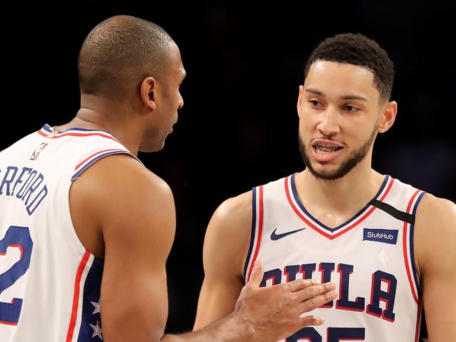 NEW YORK, NEW YORK - JANUARY 20: Al Horford #42 and Ben Simmons #25 of the Philadelphia 76ers celebrate late in the game against the Brooklyn Nets at Barclays Center on January 20, 2020 in New York City.The Philadelphia 76ers defeated the Brooklyn Nets 117-111.NOTE TO USER: User expressly acknowledges and agrees that, by downloading and or using this photograph, User is consenting to the terms and conditions of the Getty Images License Agreement.   Elsa/Getty Images/AFP == FOR NEWSPAPERS, INTERNET, TELCOS & TELEVISION USE ONLY ==