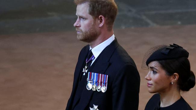 Prince Harry and Meghan, Duchess of Sussex, walking in the procession behind the Queen’s coffin. Picture: Phil Noble/Getty Images