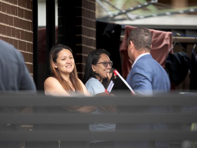 The owners of the home who found the abandoned baby talk to police.