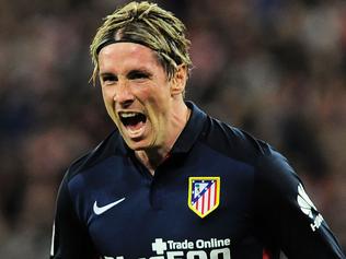 Atletico Madrid's forward Fernando Torres celebrates after scoring a goal during the Spanish league football match Athletic Club vs Atletico de Madrid at the San Mames stadium in Bilbao on April 20, 2016. / AFP PHOTO / ANDER GILLENEA