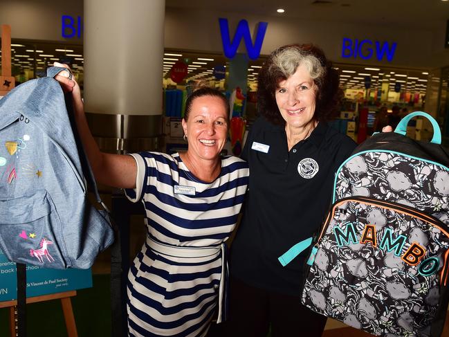 St Vincent de Paul Executive Officer Edwina Wagland and volunteer Marion Kelly call for members of the public to donate school backpacks for people less fortunate. Picture: Shae Beplate.