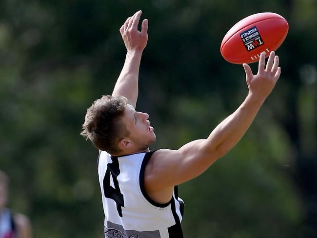 Mitch Dempster playing for Narre Warren in the AFL Outer East competition in 2019. Picture: Andy Brownbill