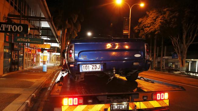 A ute is taken away after a young boy was struck by a flying tyre. Picture: Josh Woning