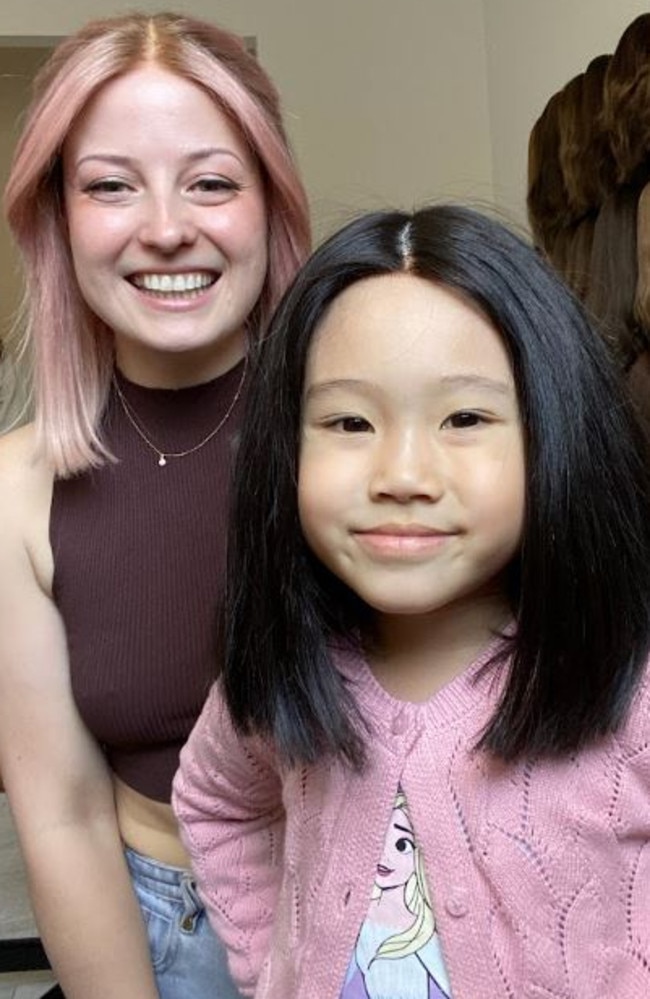 The little girl was so happy when she saw the wig on herself. Picture: Supplied/Lusta Hair