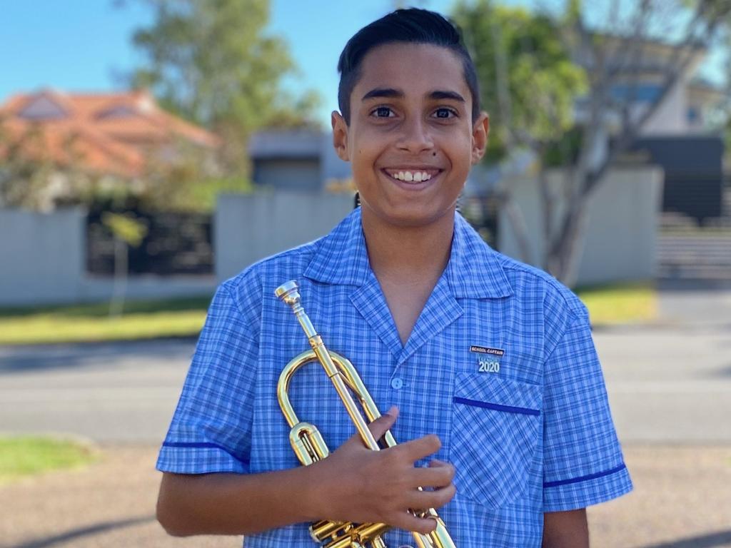 Anzac Day driveway performer Zain, from Year 6 at Middle Park State School.