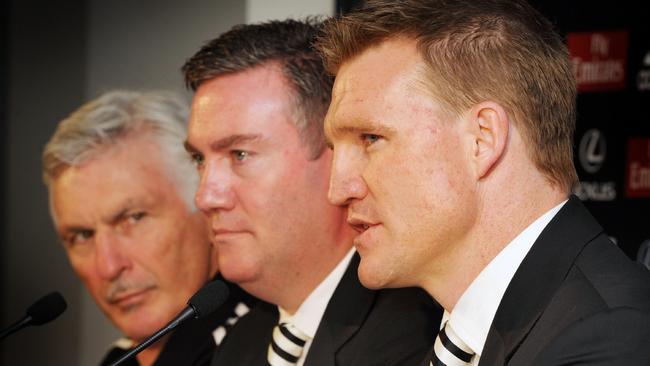 Eddie McGuire (centre) with Mick Malthouse and Nathan Buckley at the announcement of Collingwood’s coaching succession plan. Picture: Craig Borrow