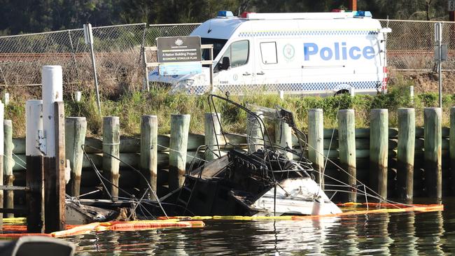 The burned remains of the boat on Monday. Picture: John Grainger