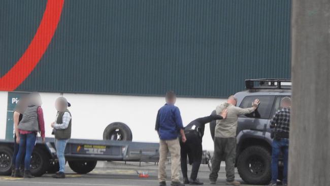 James Davis being arrested by plain-clothed AFP at Armidale Bunnings. Picture: AFP