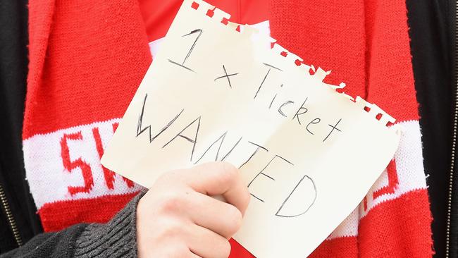Footy fans are being slugged excessive fees by websites reselling tickets to Australian Football League games. Picture: Quinn Rooney/Getty Images
