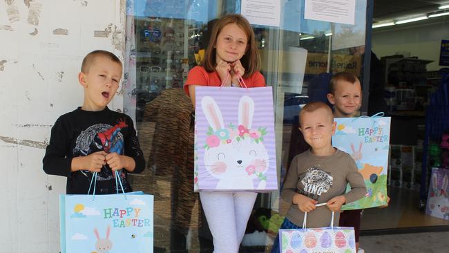 Siblings Kayden, Jamie-Lee, Levi and Bently Sarcia were the first children to reap the rewards of the Wayne's World giveaway on Easter Sunday, April 12. Photo: Laura Blackmore