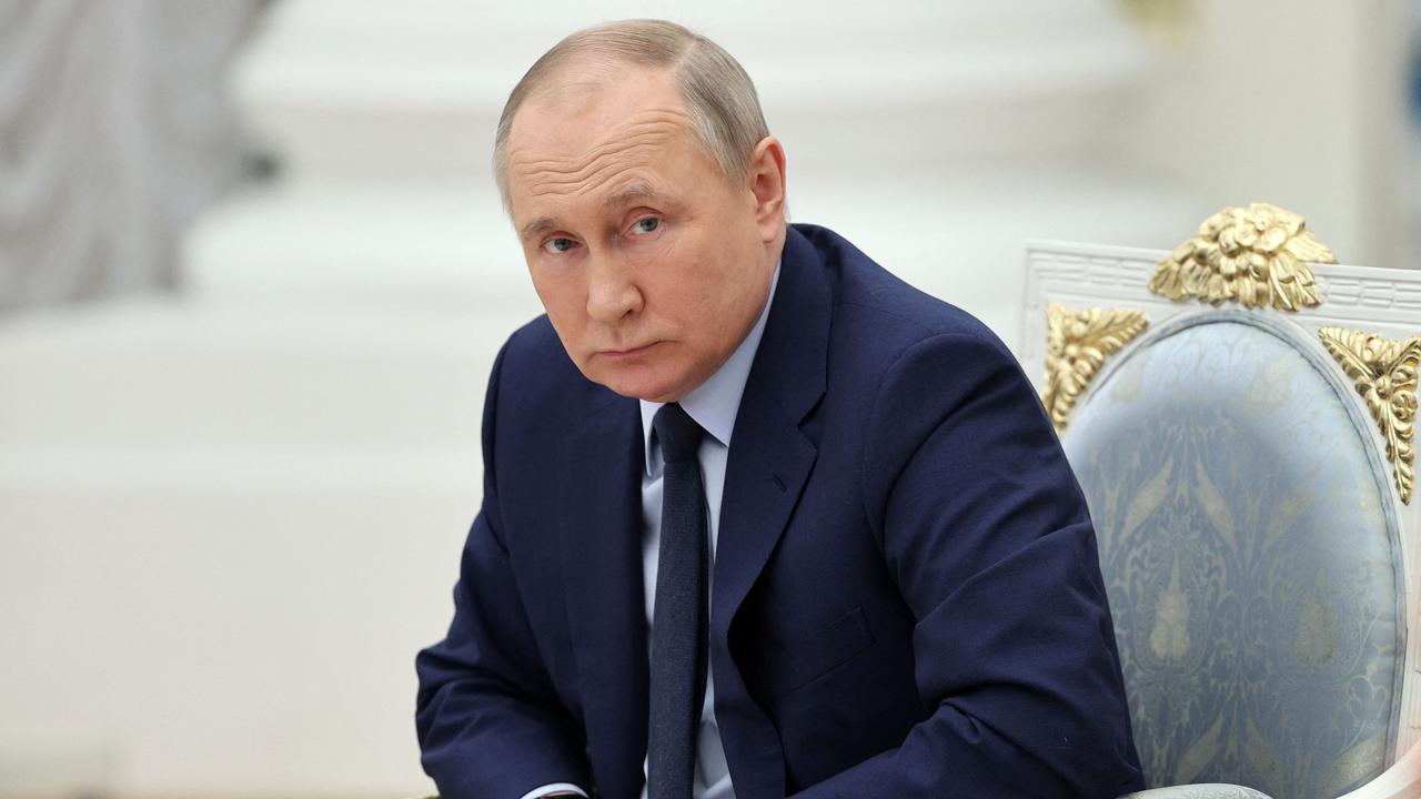 Russian President Vladimir Putin looks on as he holds a meeting of the Russia - Land of Opportunity platform supervisory board at the Catherine's Hall of the Kremlin in Moscow. Photo by Mikhail Tereshchenko / Sputnik / AFP