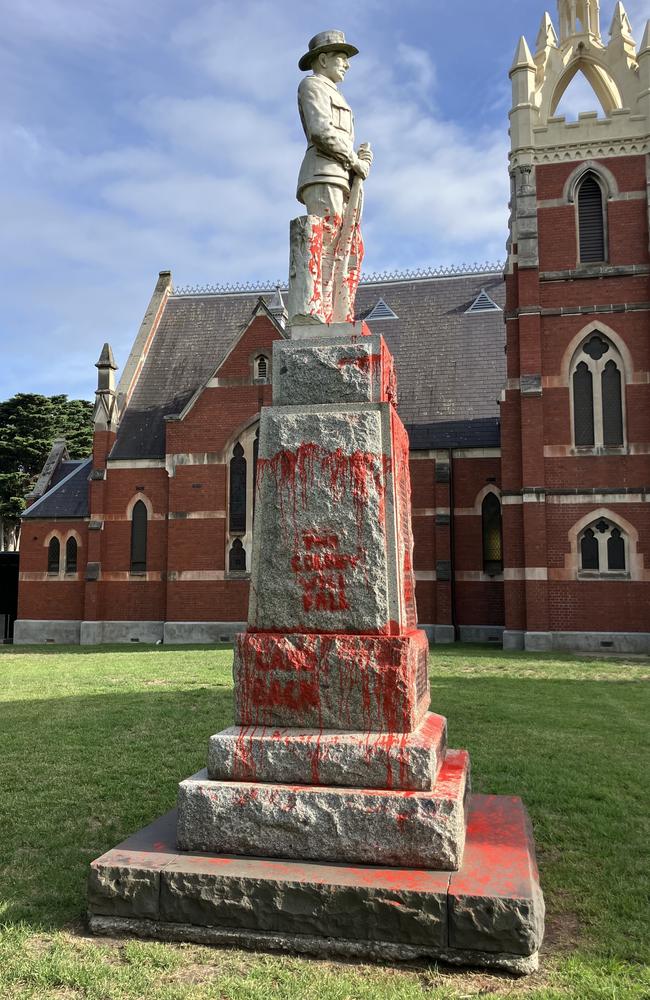 An Anzac memorial statue is doused with red paint by vandals. Picture: Bev Noonan