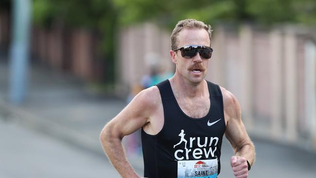 Ben St Lawrence has a commanding lead early in the 2019 Point to Pinnacle as runners made their way up Davey Street. Picture: LUKE BOWDEN