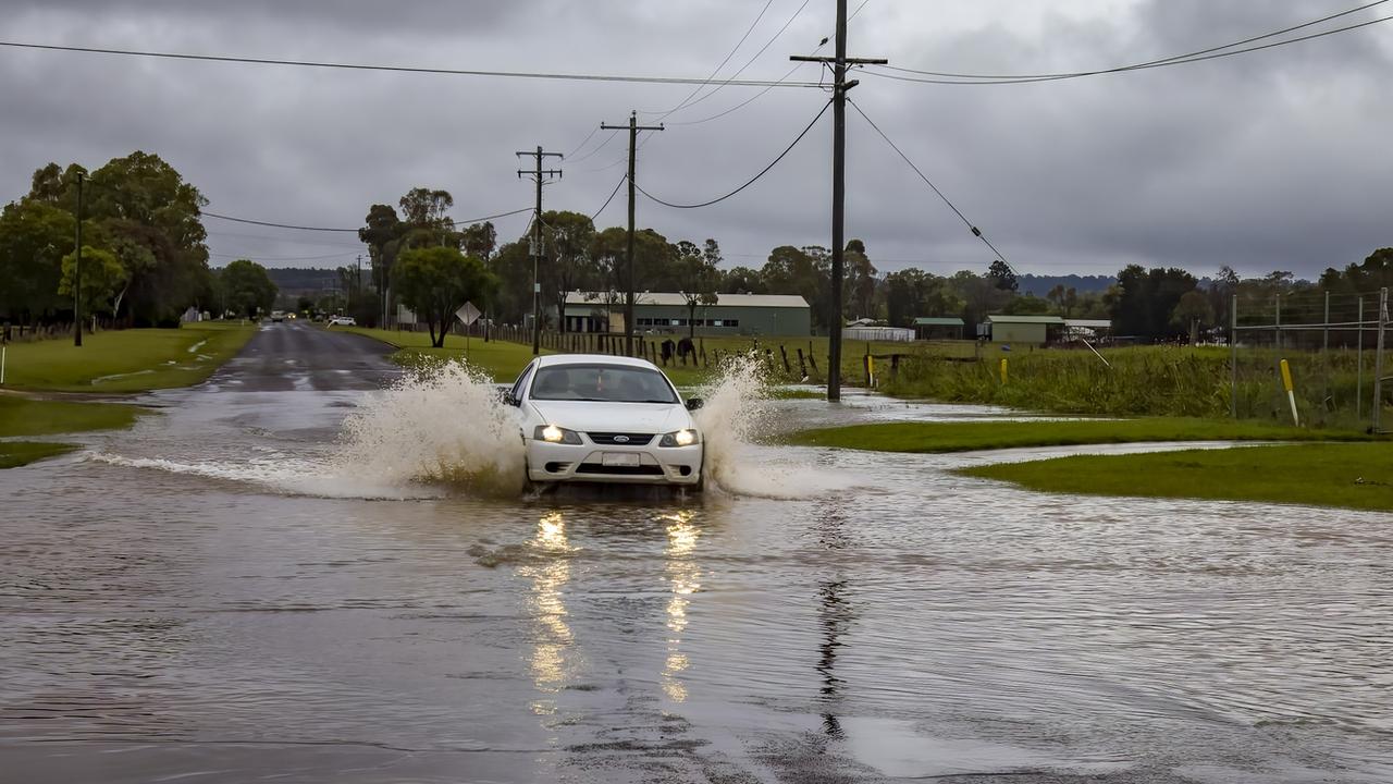 Up to 80mm of rain in Kingaroy, flooding streets and school The