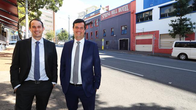 Cushman &amp; Wakefield’s Michael and Andrew Gard in front of the old Spring Hill pub they sold for $6.5m.