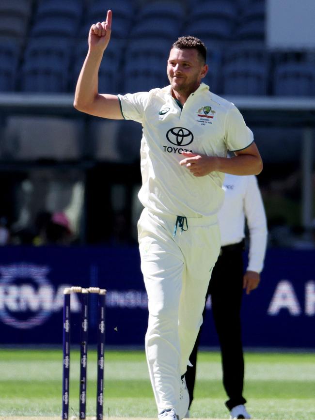 Josh Hazlewood enjoys the pink ball. Picture: COLIN MURTY / AFP