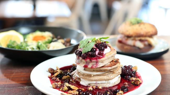 Mr Bengel at Palm Beach is Justin Lane owner Adam Haralampou 's new cafe. The green breaky, buckwheat pancakes and bacon and egg burger. Picture: Richard Gosling