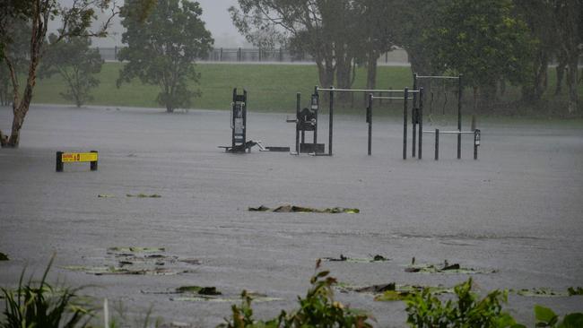 A flooded park opposite Ingham High School (pictured top). The floods in Hinchinbrook Shire, North Queensland. Picture: Cameron Bates