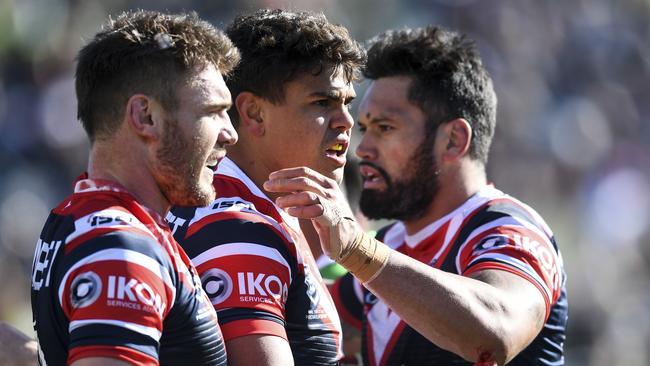 Roosters star Latrell Mitchell after scoring a try in Canberra on Sunday